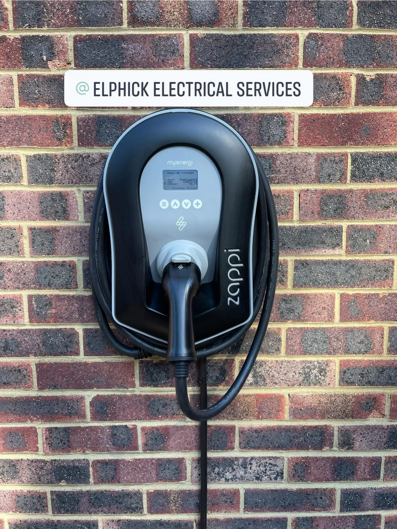 Zappi EV charge point installed on a brick wall
